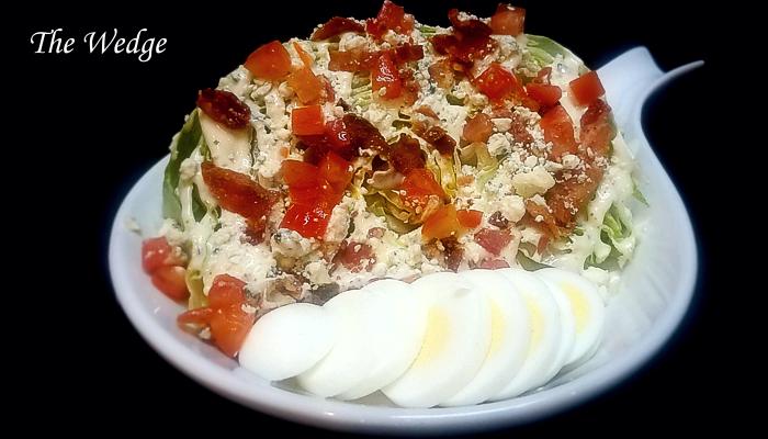 >The Wedge Salad on Restaurant Menu at Three Sisters Tavern and Grill